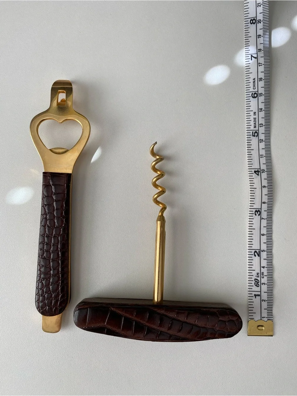 Vintage mid-century brass and faux-crocodile leather bar set.